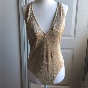 Gold bathing suit
